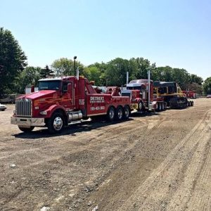 tow truck hauling a semi with an oversized load